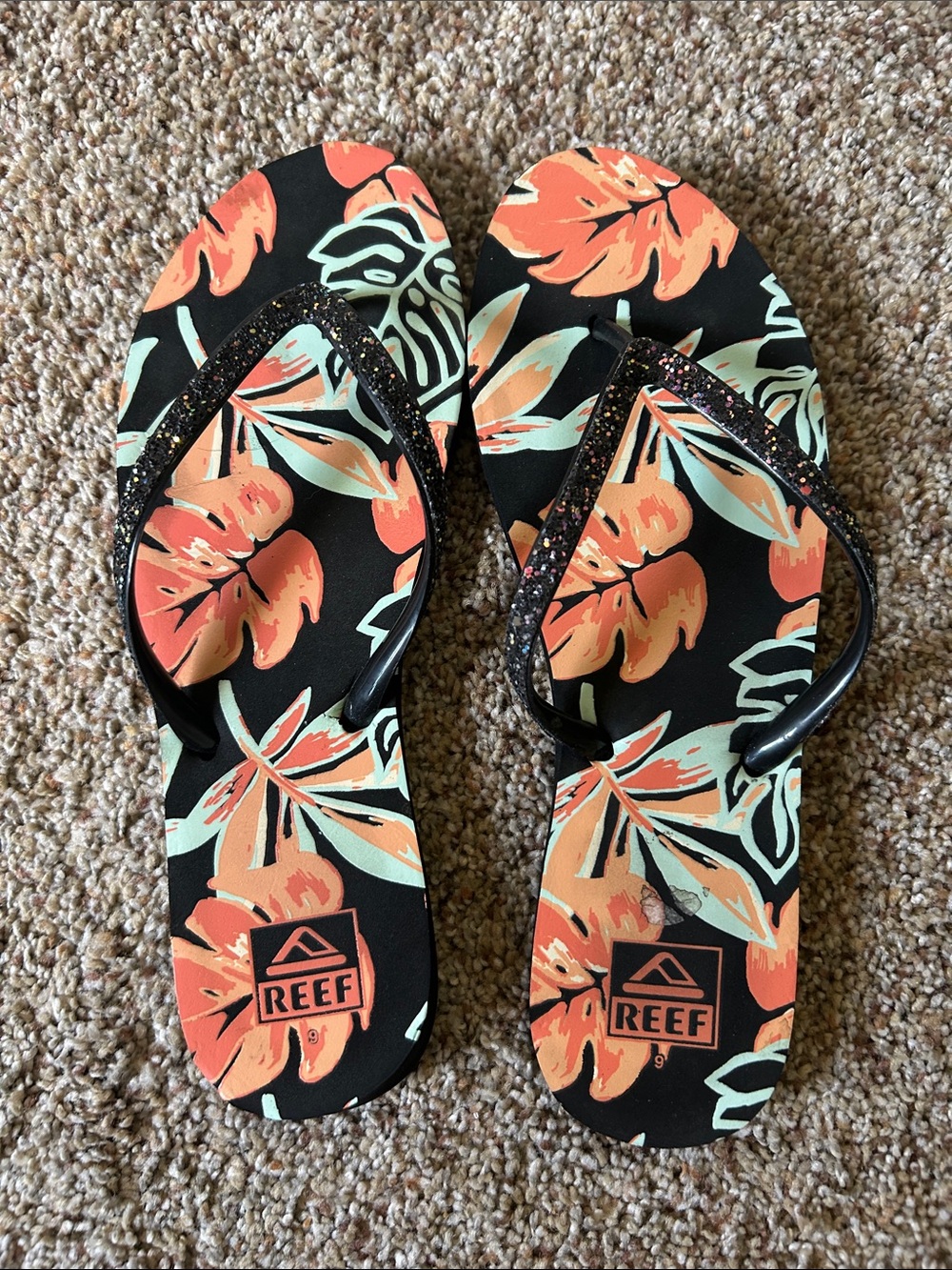 Reef Bliss-Full flip flops featuring a black Monstera leaf print with glitter st
